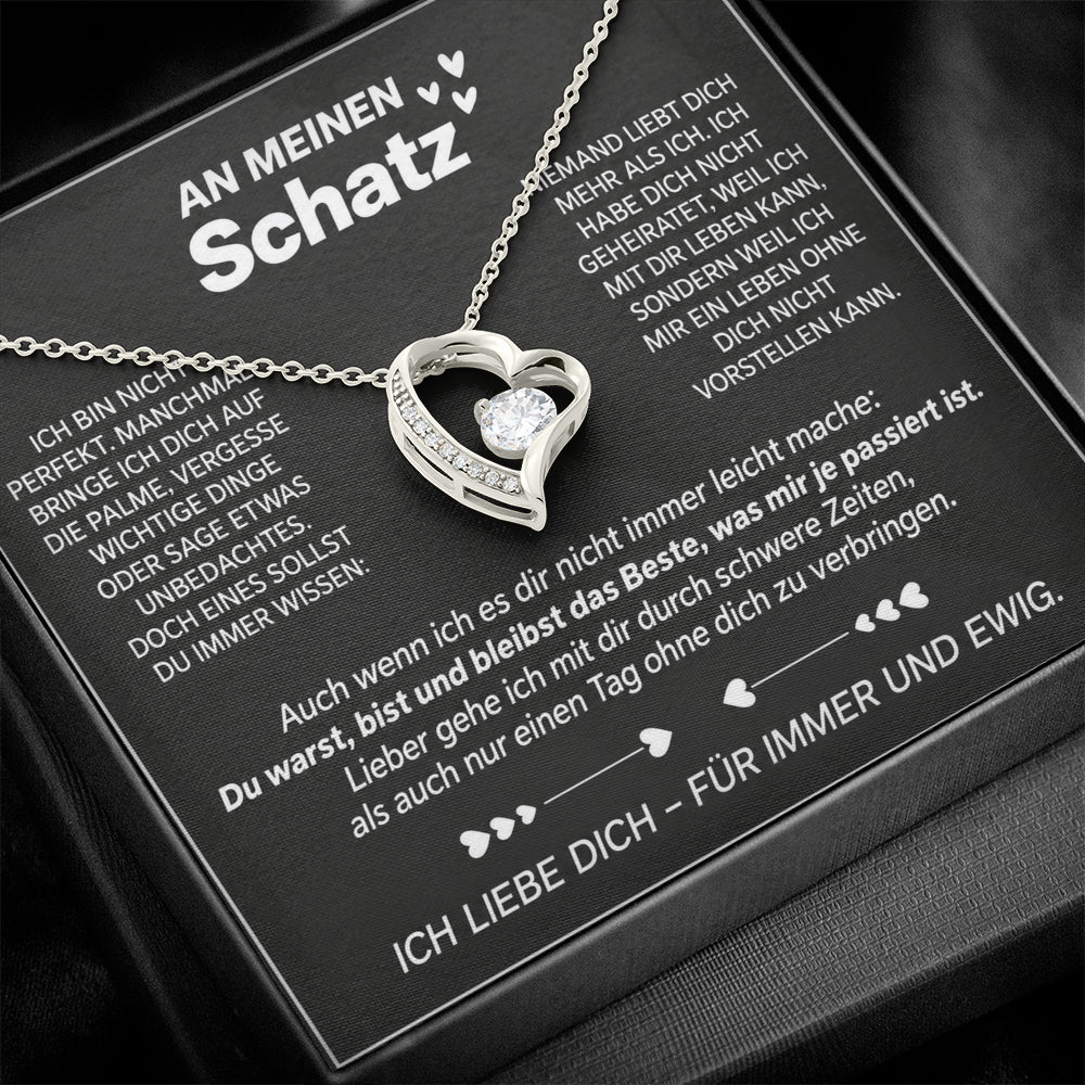 Weißgold-Herzanhänger mit Zirkonia auf der Botschaftskarte An meinen Schatz in der schwarzen Premium Box