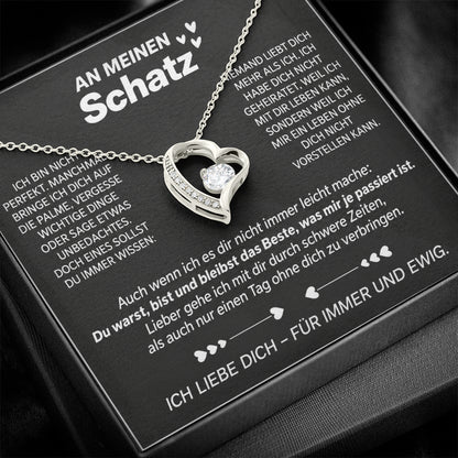 Weißgold-Herzanhänger mit Zirkonia auf der Botschaftskarte An meinen Schatz in der schwarzen Premium Box
