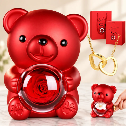 Rote Teddy-Rosenbox mit goldener Doppelherz-Halskette und Geschenkverpackung auf hellem Marmor